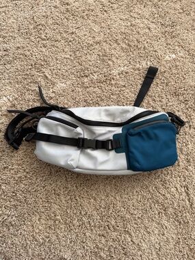 Tumi Light Gray and Teal Sling Belt Bag